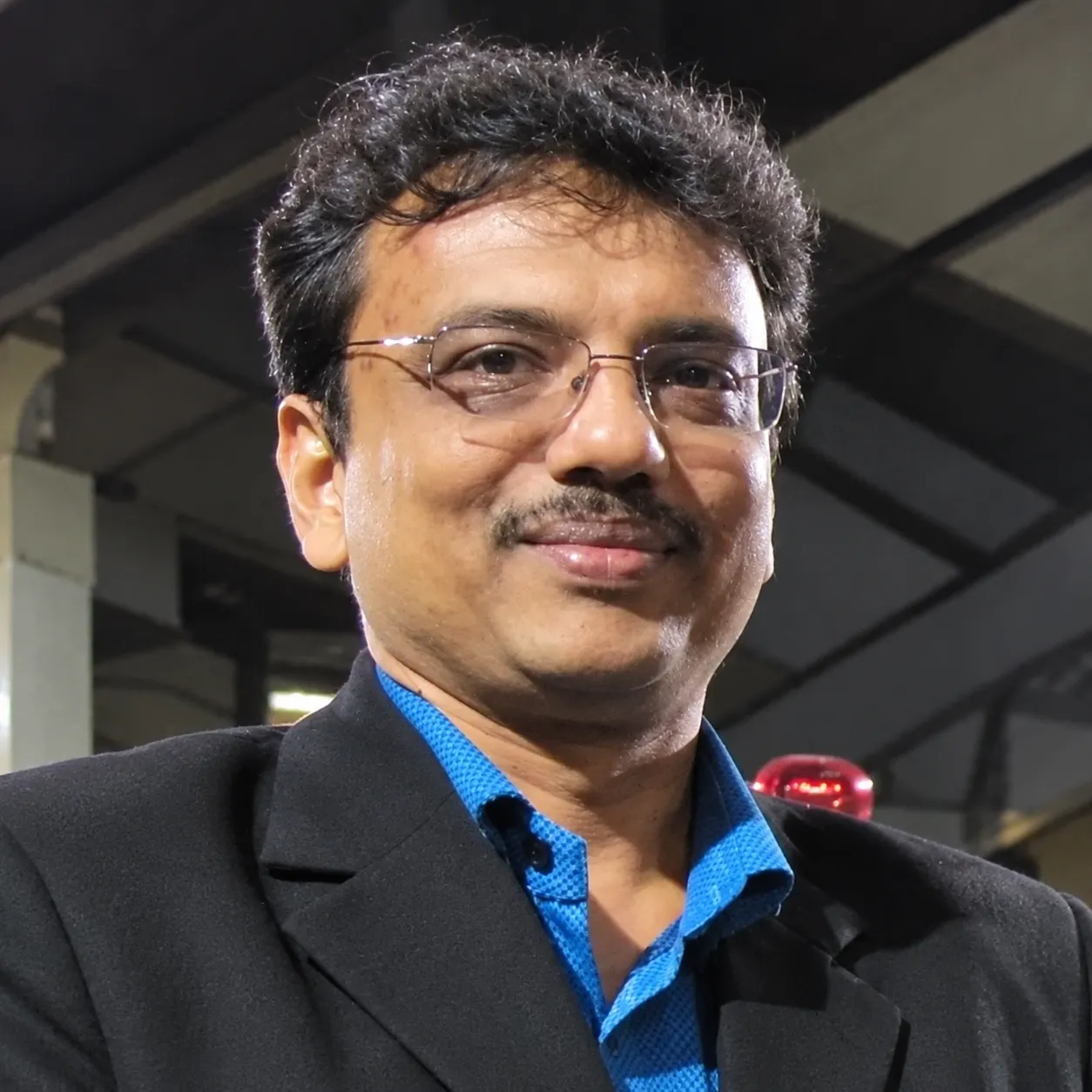 About Rajiv K Poddar